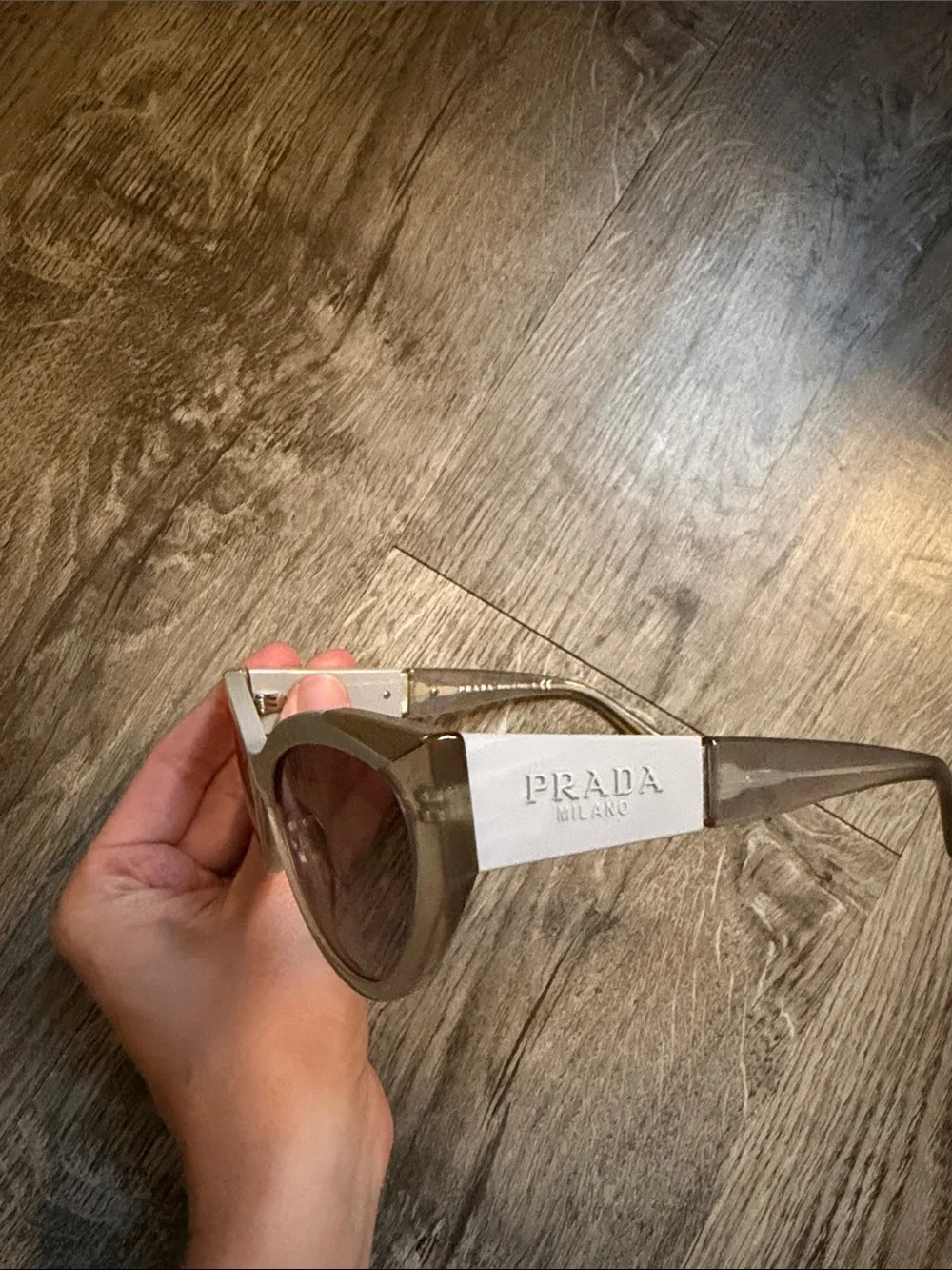 Prada Cat-Eye Sunglasses in Light Gray and Clear